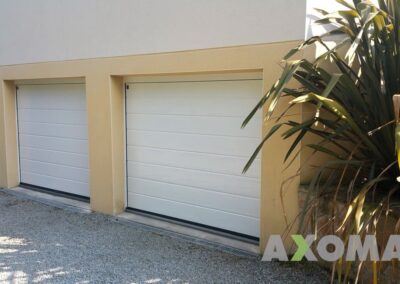 Pose porte sectionnelle blanche HORMANN RENOMATIC aluminium à Vallet 44