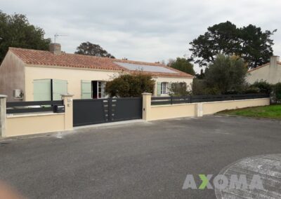 Portail coulissant GUEL aluminium fabriqué sur mesure et posé à Trignac